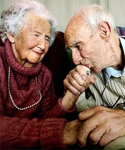 Man Kissing Woman's Hand